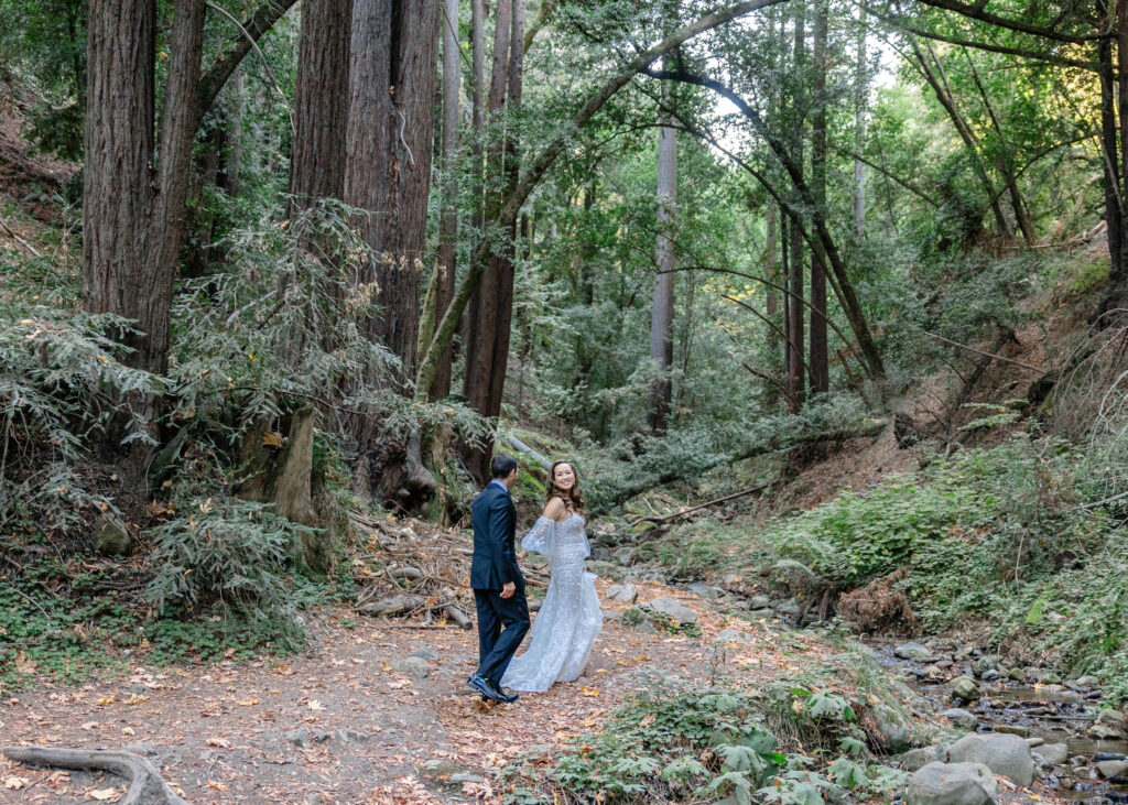 A bride and groom walk in Saratoga Springs