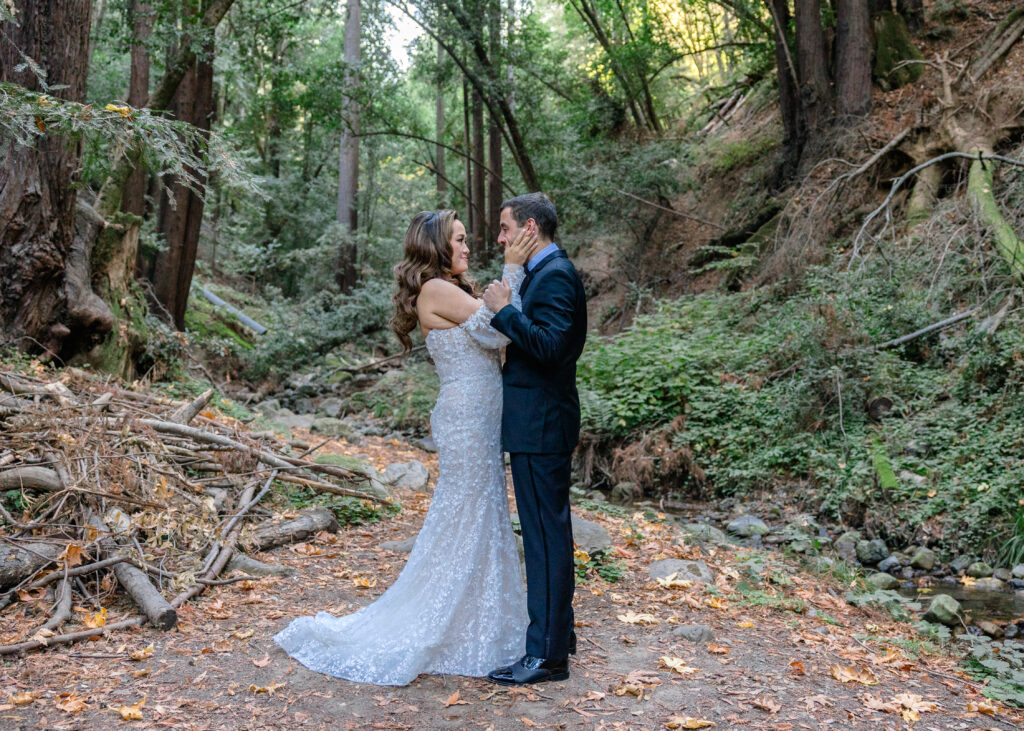 A bride and groom stare into one anothers eyes at Saratoga Springs