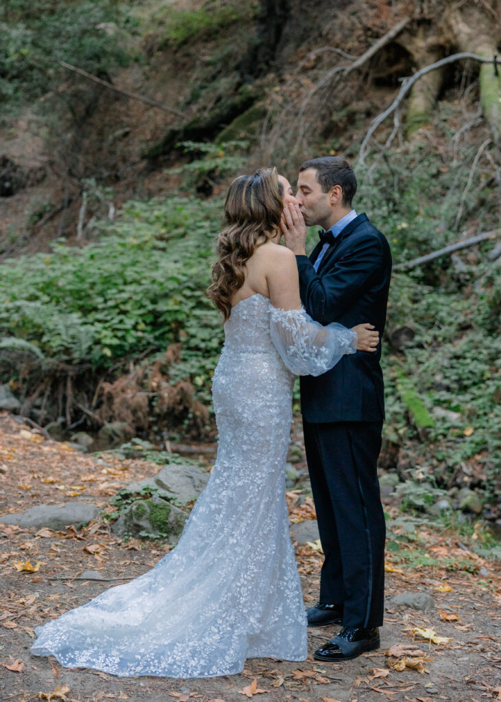 A bride and groom kiss at Saratoga Springs