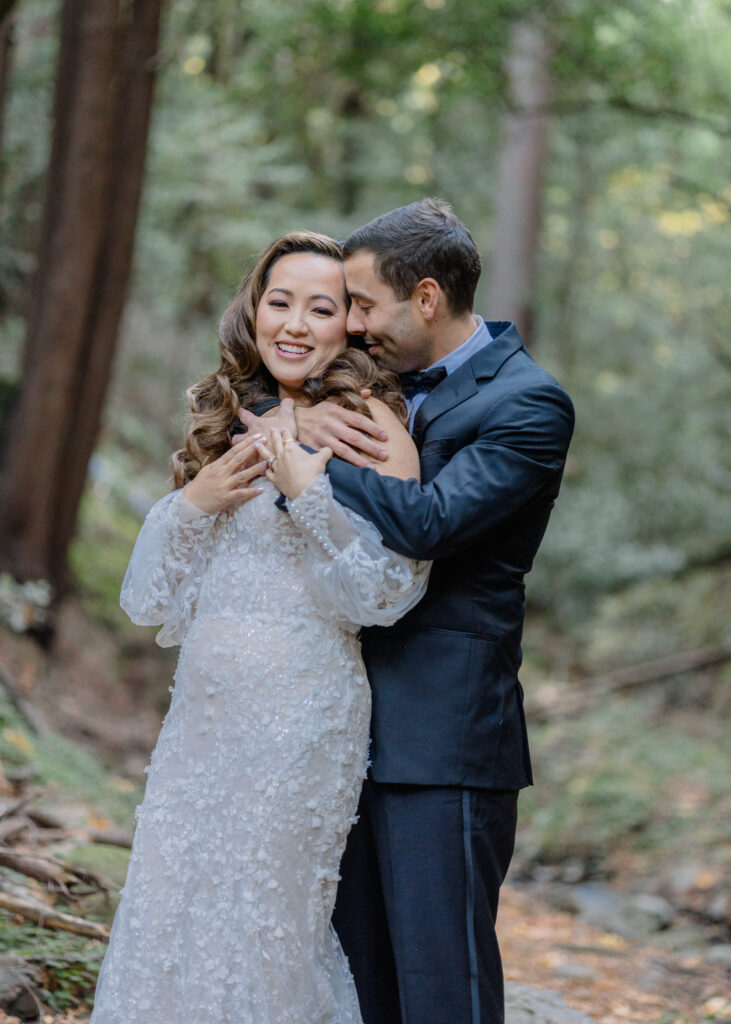 A gentle embrace with a bride and groom