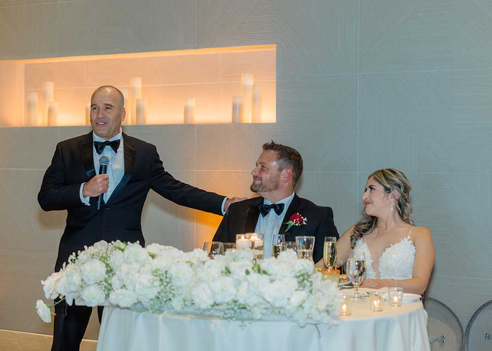Dulce and John smiling at Palm Event Center wedding by Anvi Parikh Photography